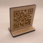 Custom QR code laser engraved for restaurants and bars