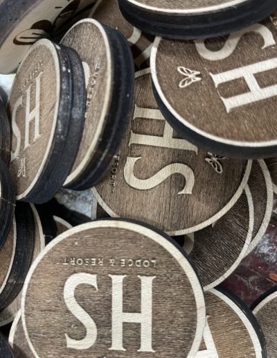 HS lodge and resort custom round wood nickels